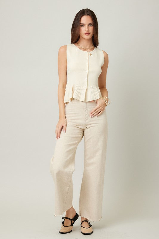 SLEEVELESS CREAM KNIT RUFFLE HEM CARDIGAN